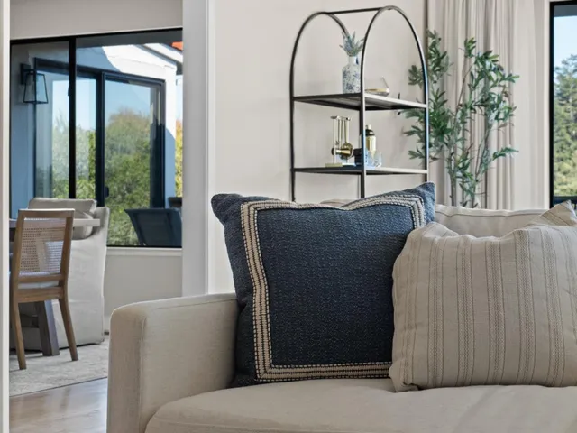 a bathroom with double vanity sinks and a mirror
