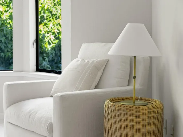 a bathroom with a granite countertop sink mirror and toilet