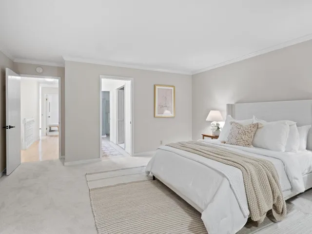 a bathroom with a toilet shower and a sink