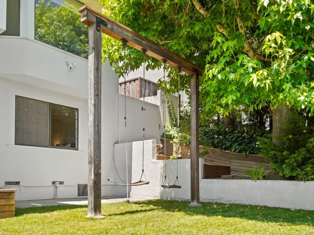 a front view of a house with an outdoor space