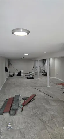 a room with lots of mirrors and window