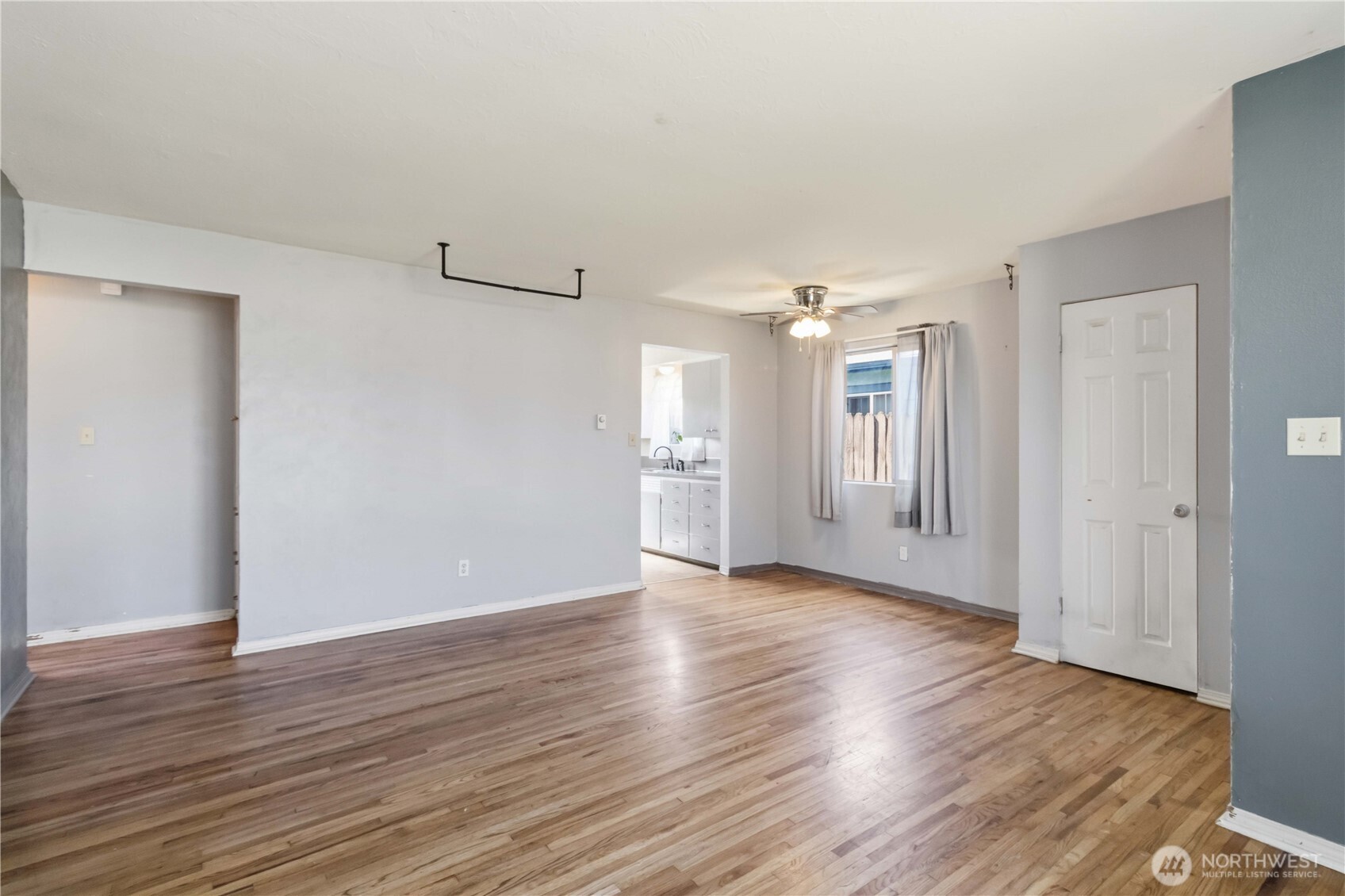 356 28th Avenue Longview, WA 98632 - Photo 7 of 24 a view of an empty room with wooden floor