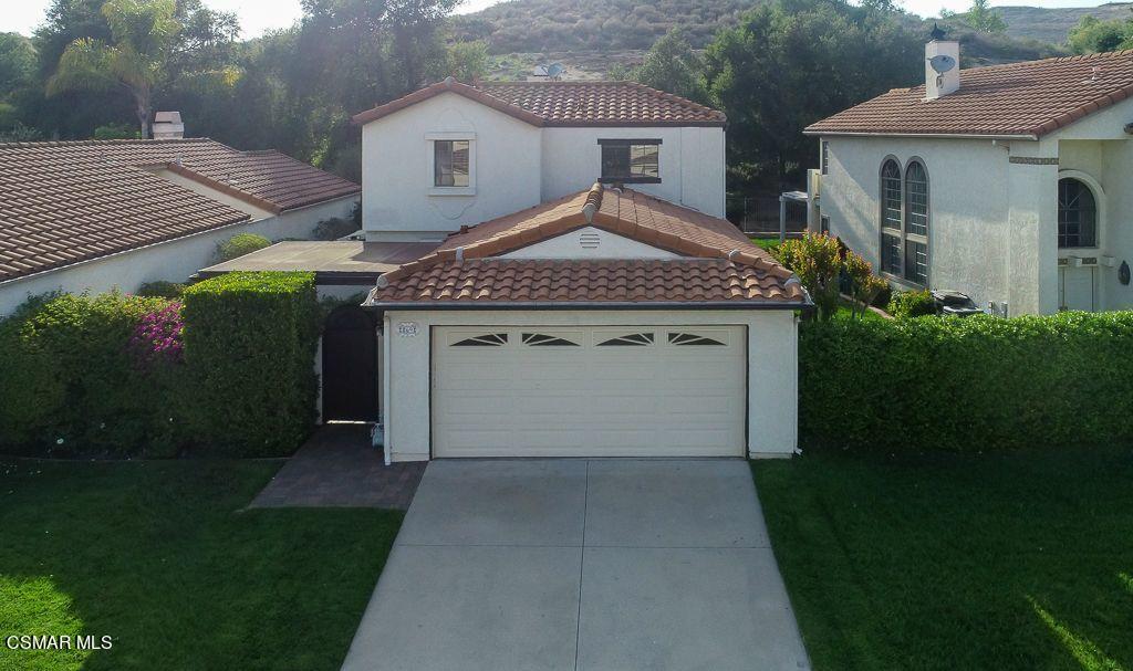 869 Congressional Road Simi Valley, CA 93065 - Photo 1 of 38 a view of a house with garden