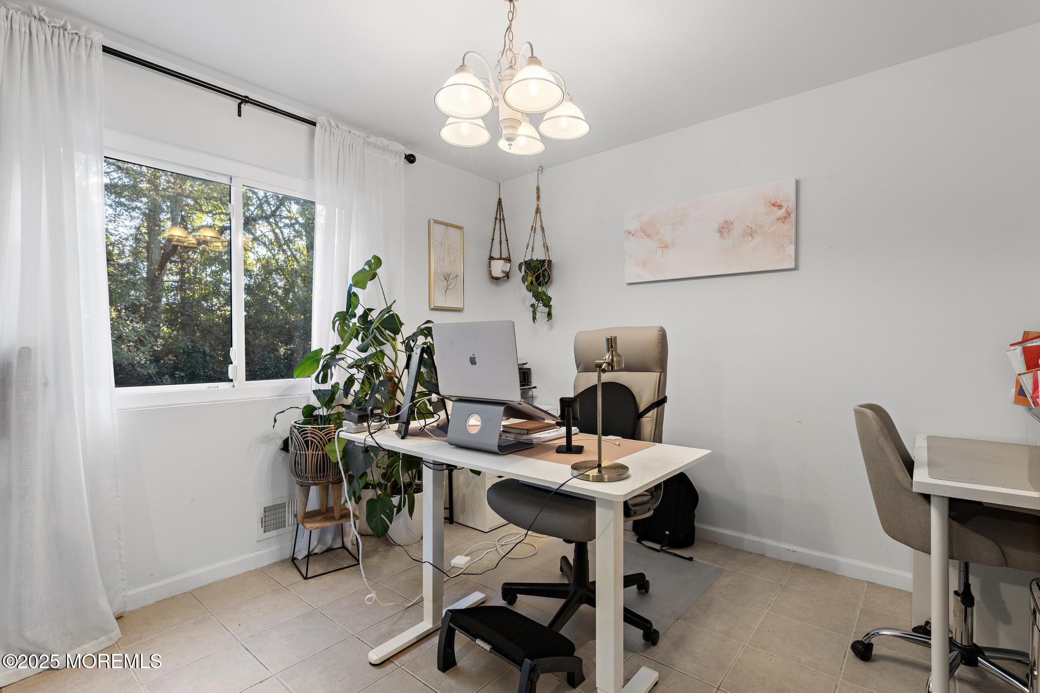 343 Middlewood Road Middletown, NJ 07748 - Photo 12 of 30 a view of a dining room with furniture window and outside view