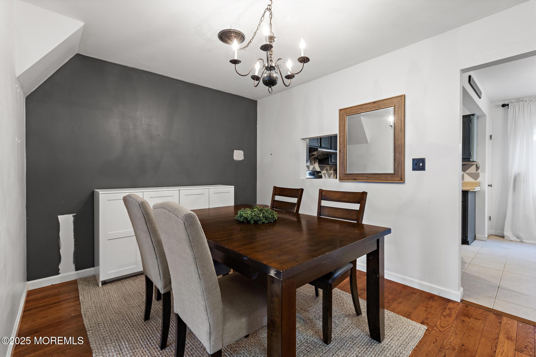 343 Middlewood Road Middletown, NJ 07748 - Photo 13 of 30 a view of a dining room with furniture and wooden floor