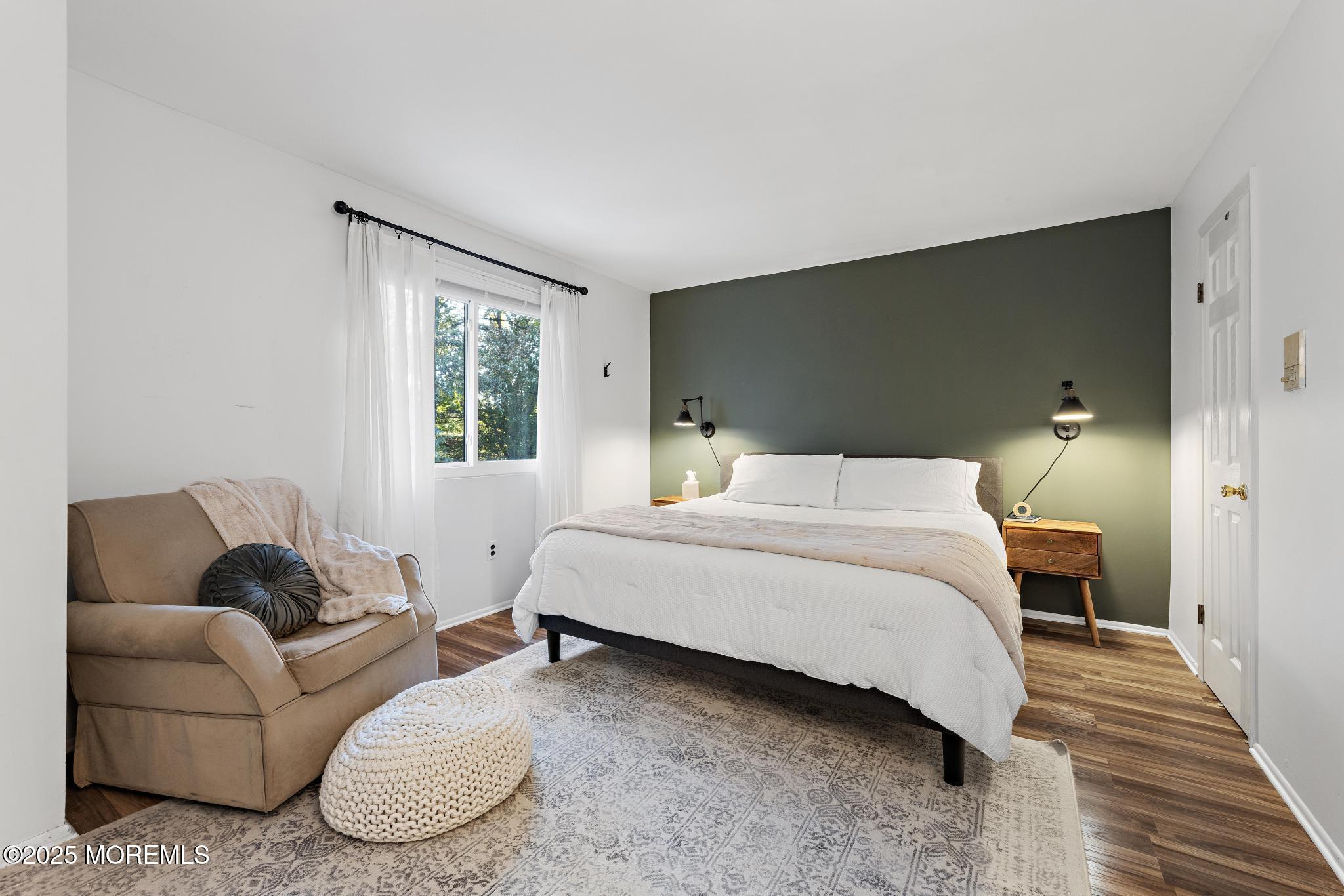 343 Middlewood Road Middletown, NJ 07748 - Photo 19 of 30 a bedroom with a bed and a couch