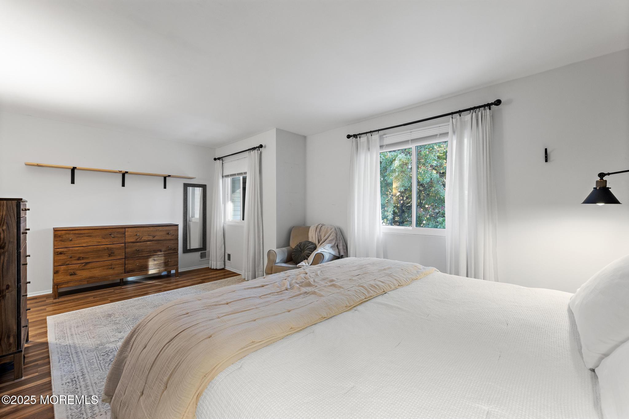 343 Middlewood Road Middletown, NJ 07748 - Photo 20 of 30 a bedroom with a large bed and a tv