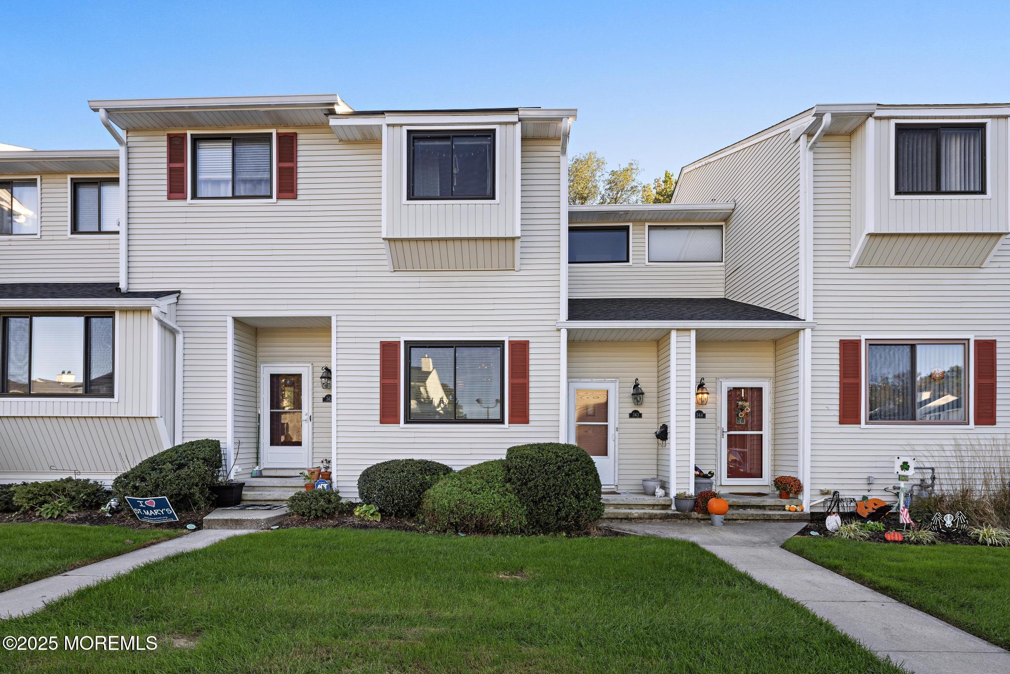 343 Middlewood Road Middletown, NJ 07748 - Photo 2 of 30 a front view of a house with a yard