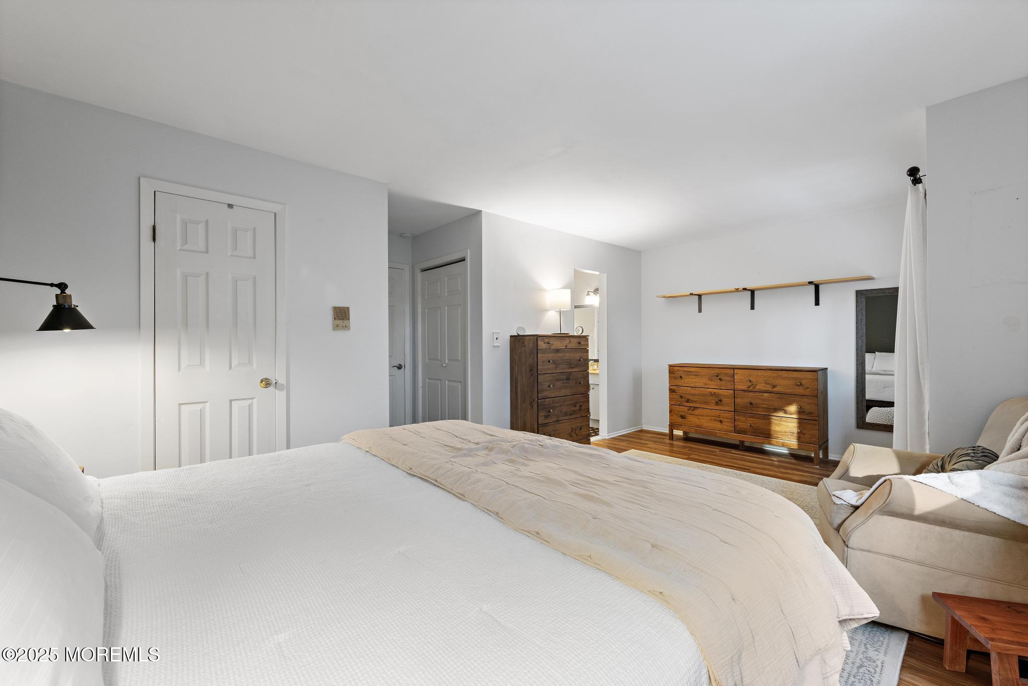 343 Middlewood Road Middletown, NJ 07748 - Photo 22 of 30 a bedroom with a bed and a couch