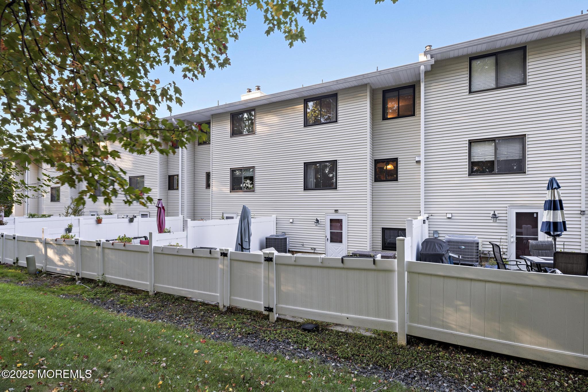 343 Middlewood Road Middletown, NJ 07748 - Photo 30 of 30 a view of house that has a lot of plants and trees