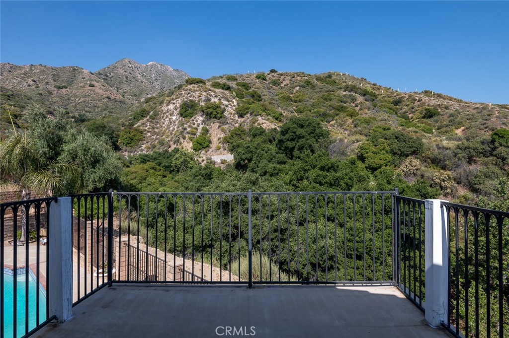 7117 Lonzo Street Tujunga, CA 91042 - Photo 43 of 49 a view of a large building with a mountain in the background