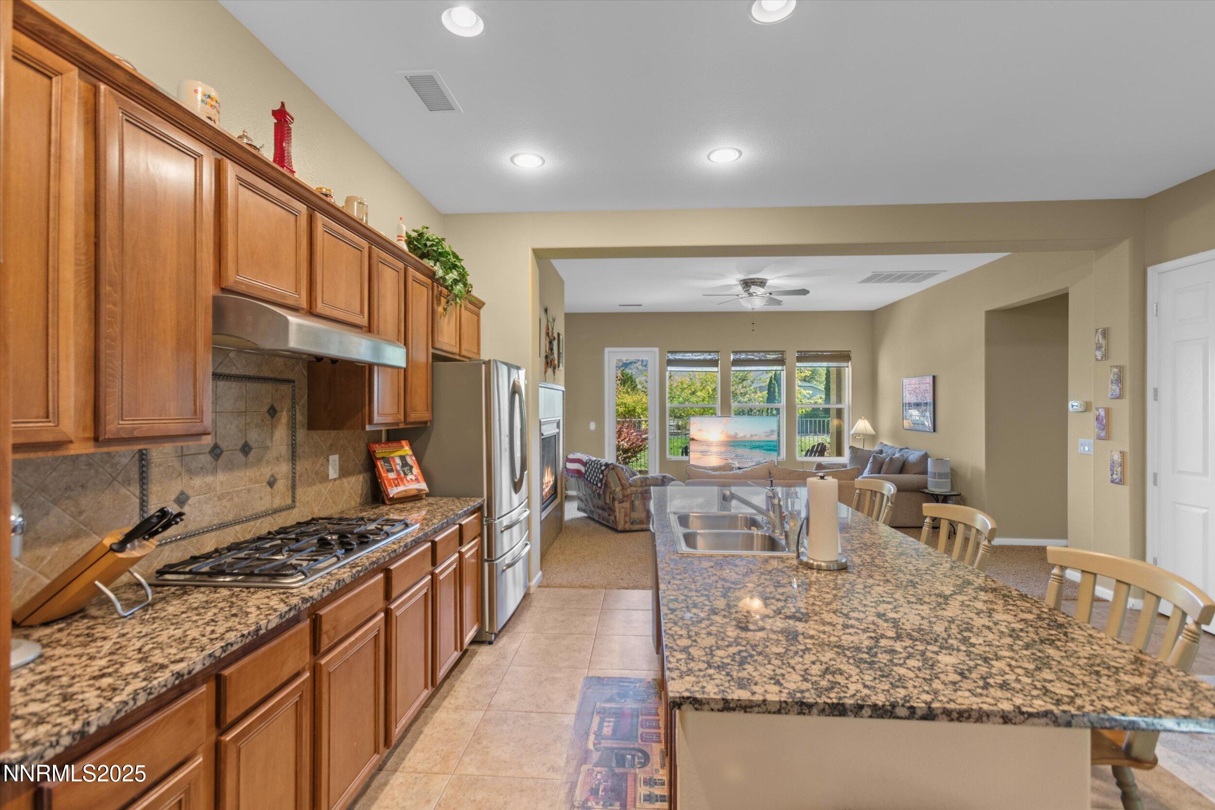 10900 Serratina Drive Reno, NV 89521 - Photo 12 of 47 a very nice looking kitchen with a large window