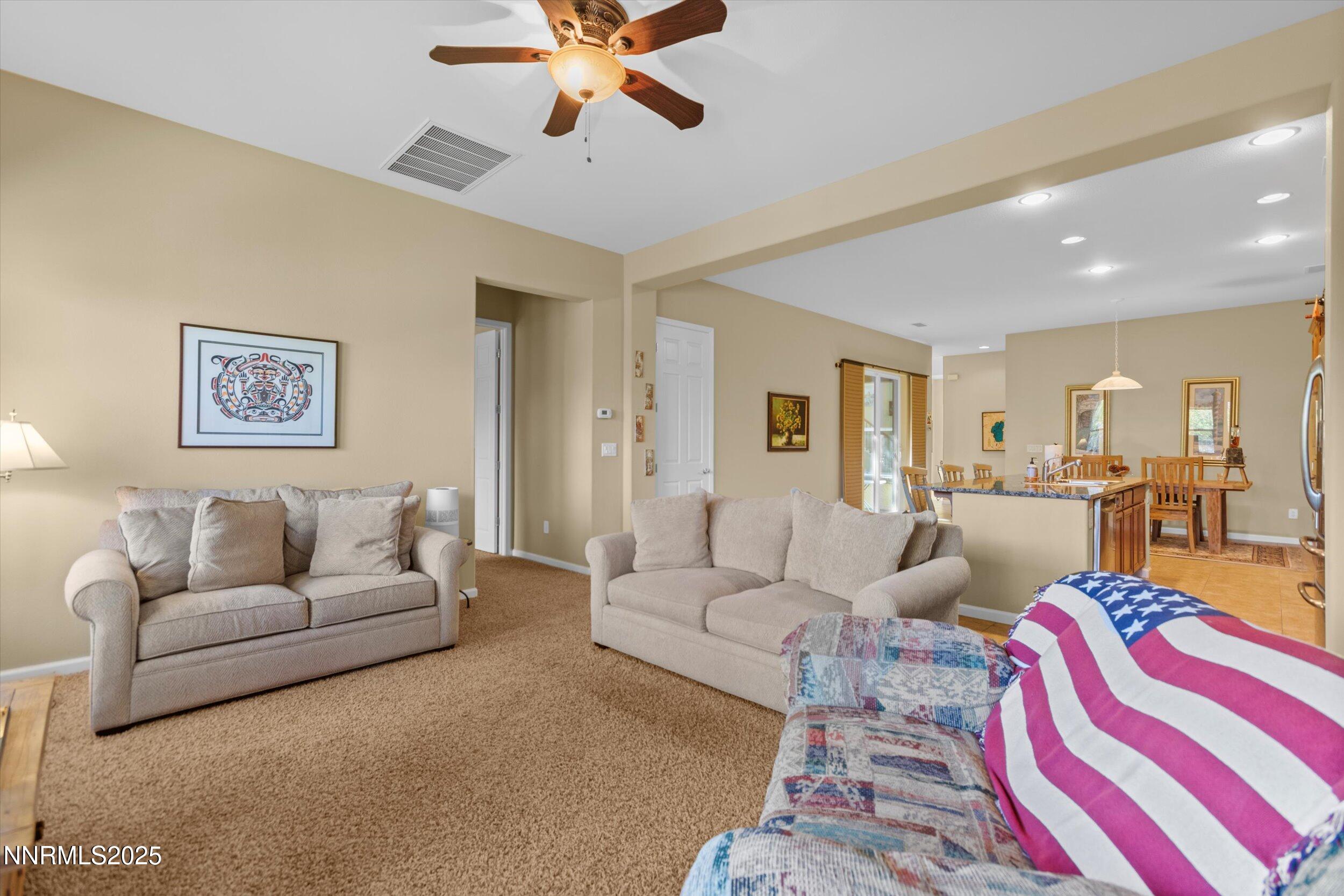 10900 Serratina Drive Reno, NV 89521 - Photo 17 of 47 a living room with furniture and a view of bedroom