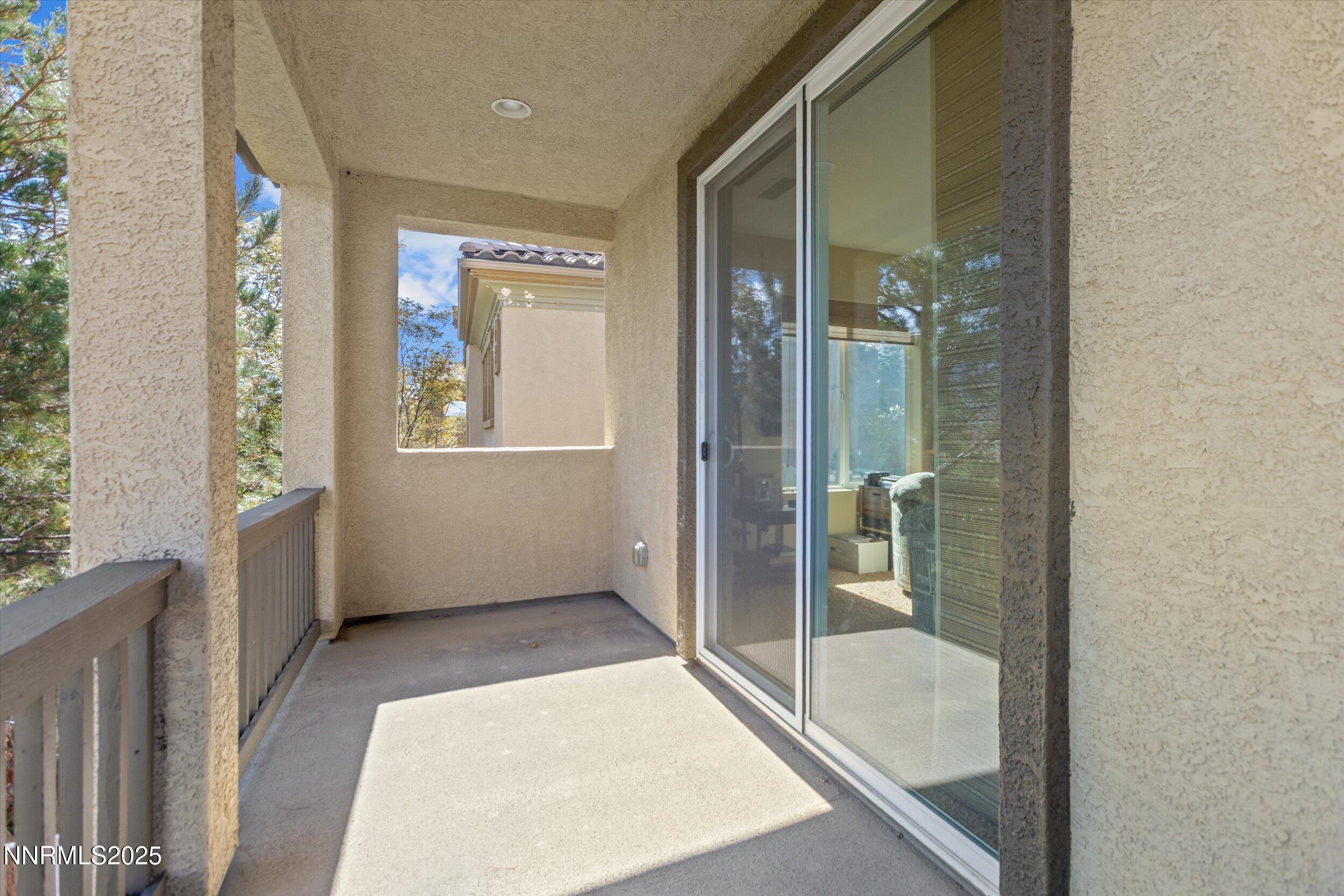 10900 Serratina Drive Reno, NV 89521 - Photo 28 of 47 a bathroom with a tub shower and sink