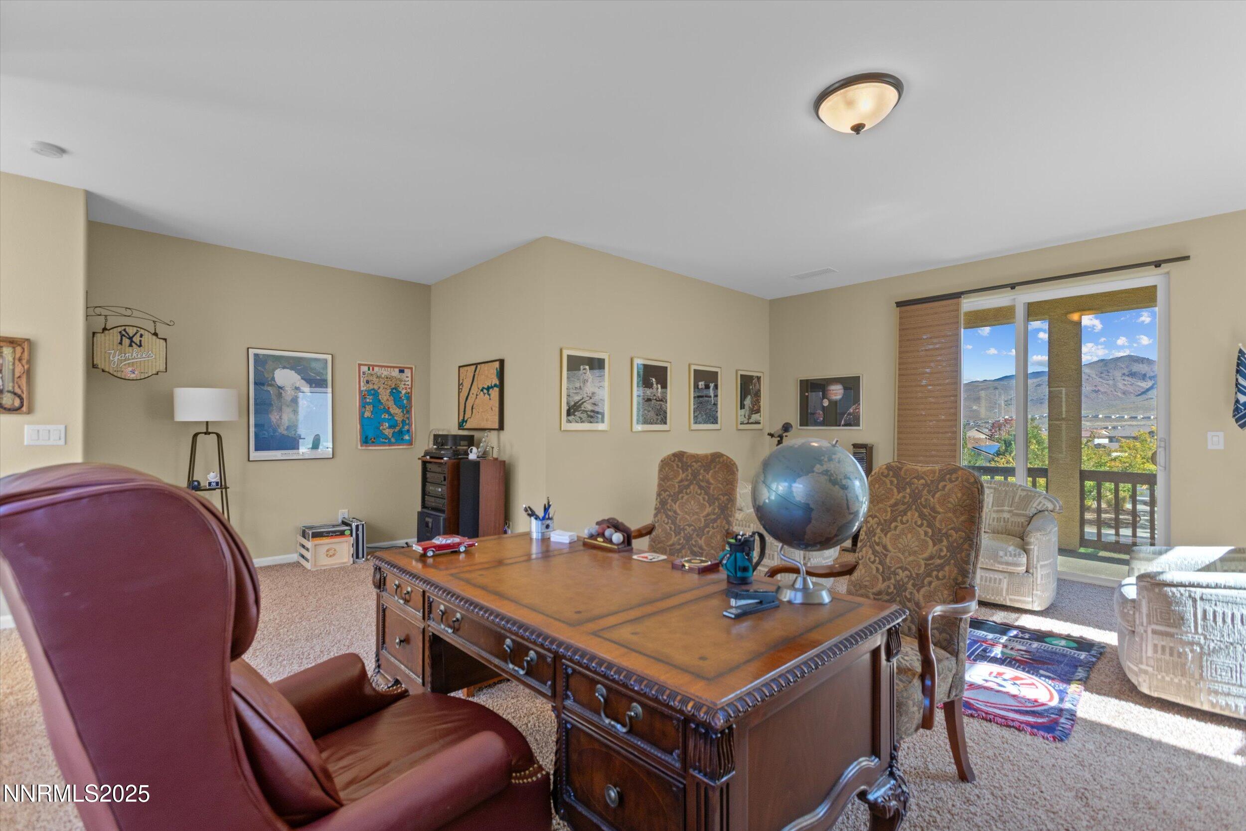 10900 Serratina Drive Reno, NV 89521 - Photo 34 of 47 a living room with furniture and wooden floor