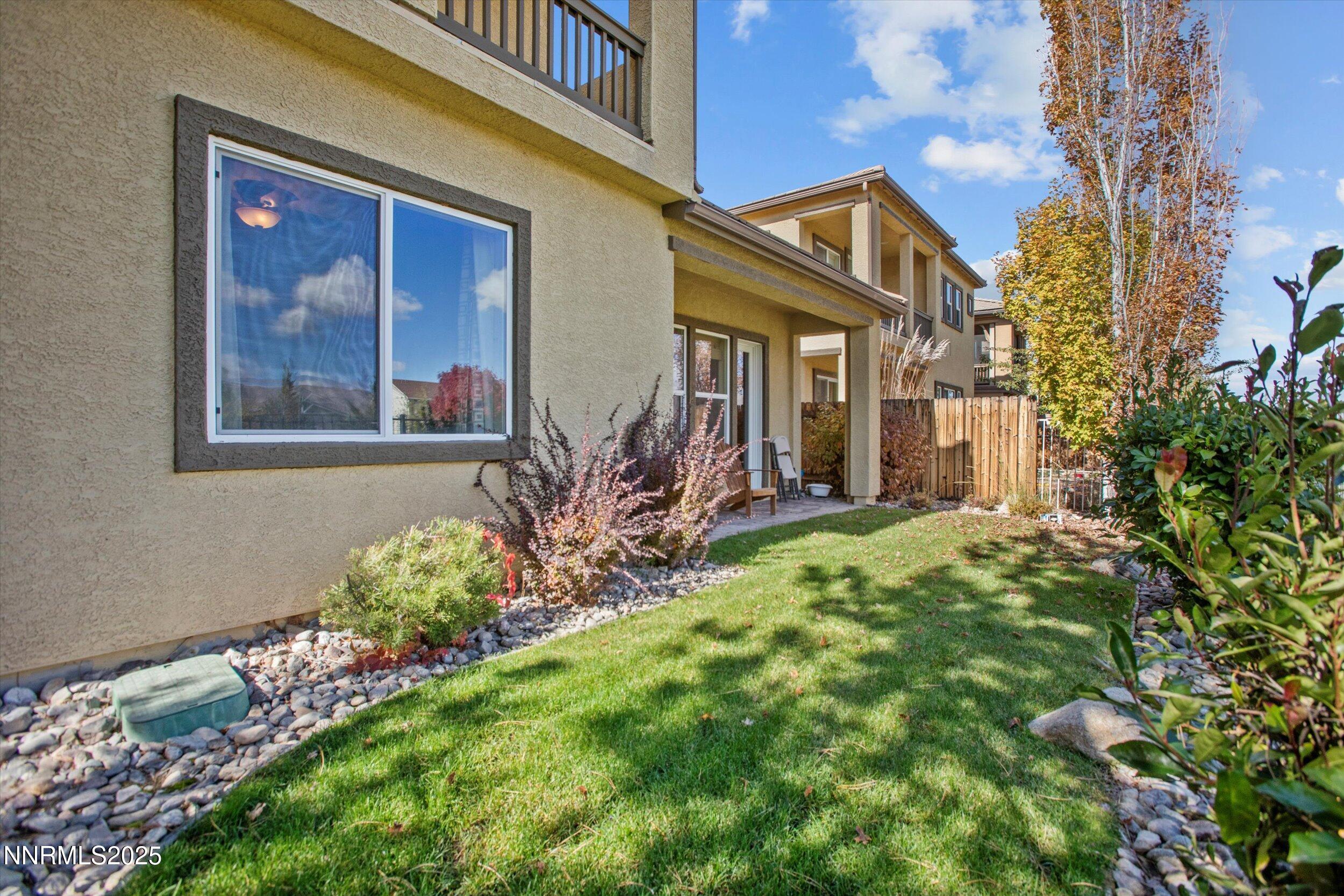 10900 Serratina Drive Reno, NV 89521 - Photo 37 of 47 a front view of a house with a yard