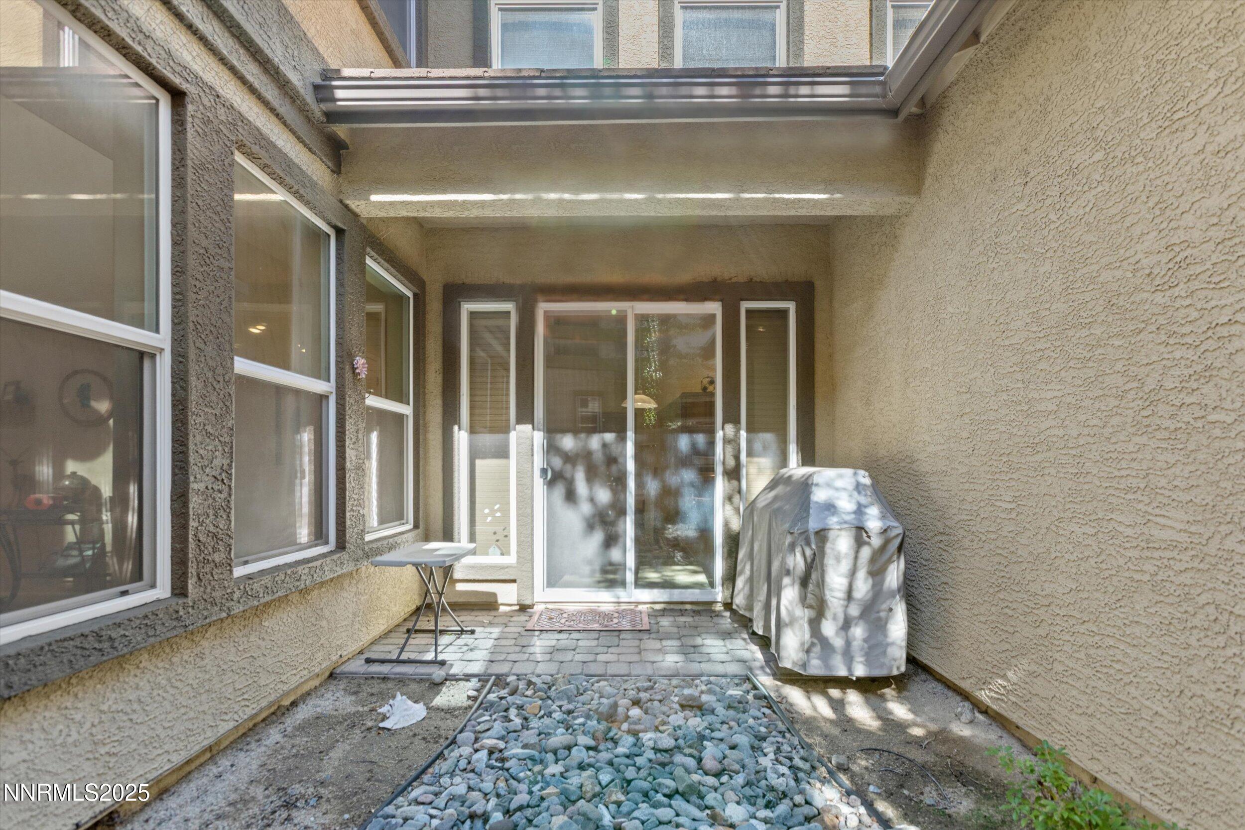 10900 Serratina Drive Reno, NV 89521 - Photo 43 of 47 a view of a entryway door of the house