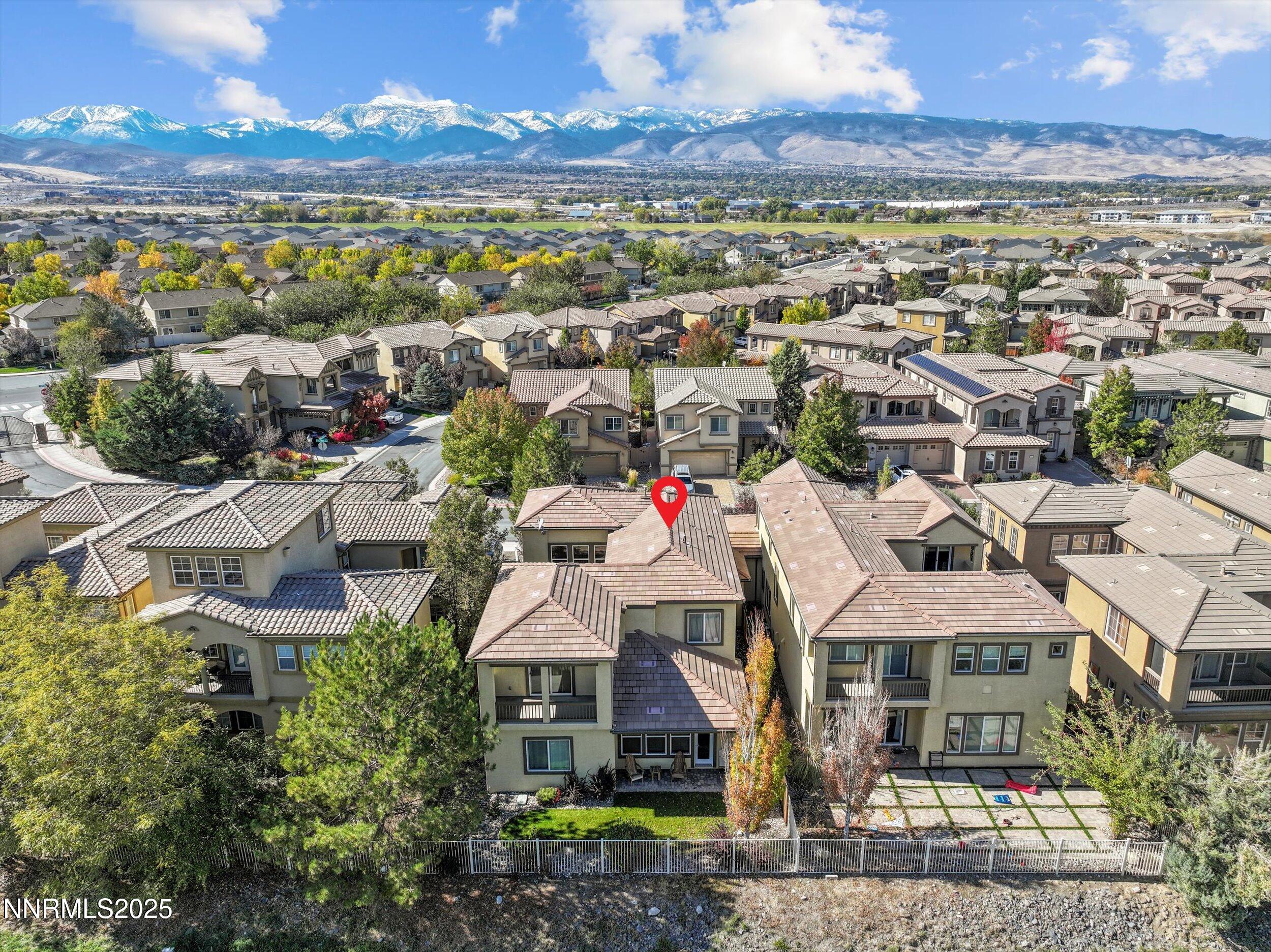 10900 Serratina Drive Reno, NV 89521 - Photo 46 of 47 a view of a city with mountains in the background
