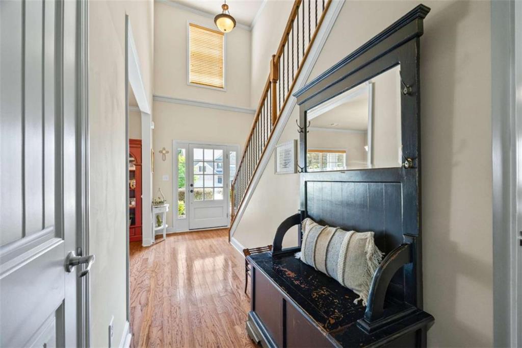 42 Pintail Lane Jefferson, GA 30549 - Photo 3 of 42 a view of an entryway with wooden floor and door