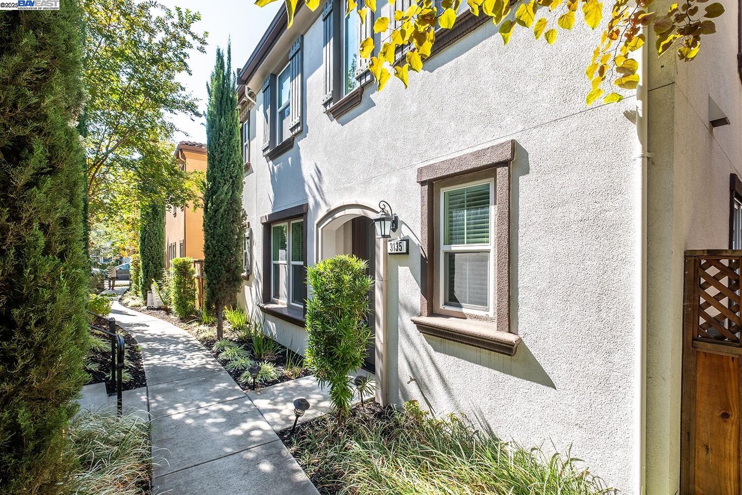 3135 Vittoria Loop Dublin, CA 94568 - Photo 1 of 38 a front view of a house with a yard