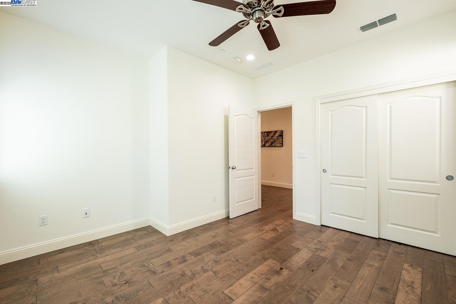 3135 Vittoria Loop Dublin, CA 94568 - Photo 19 of 38 wooden floor in an empty room
