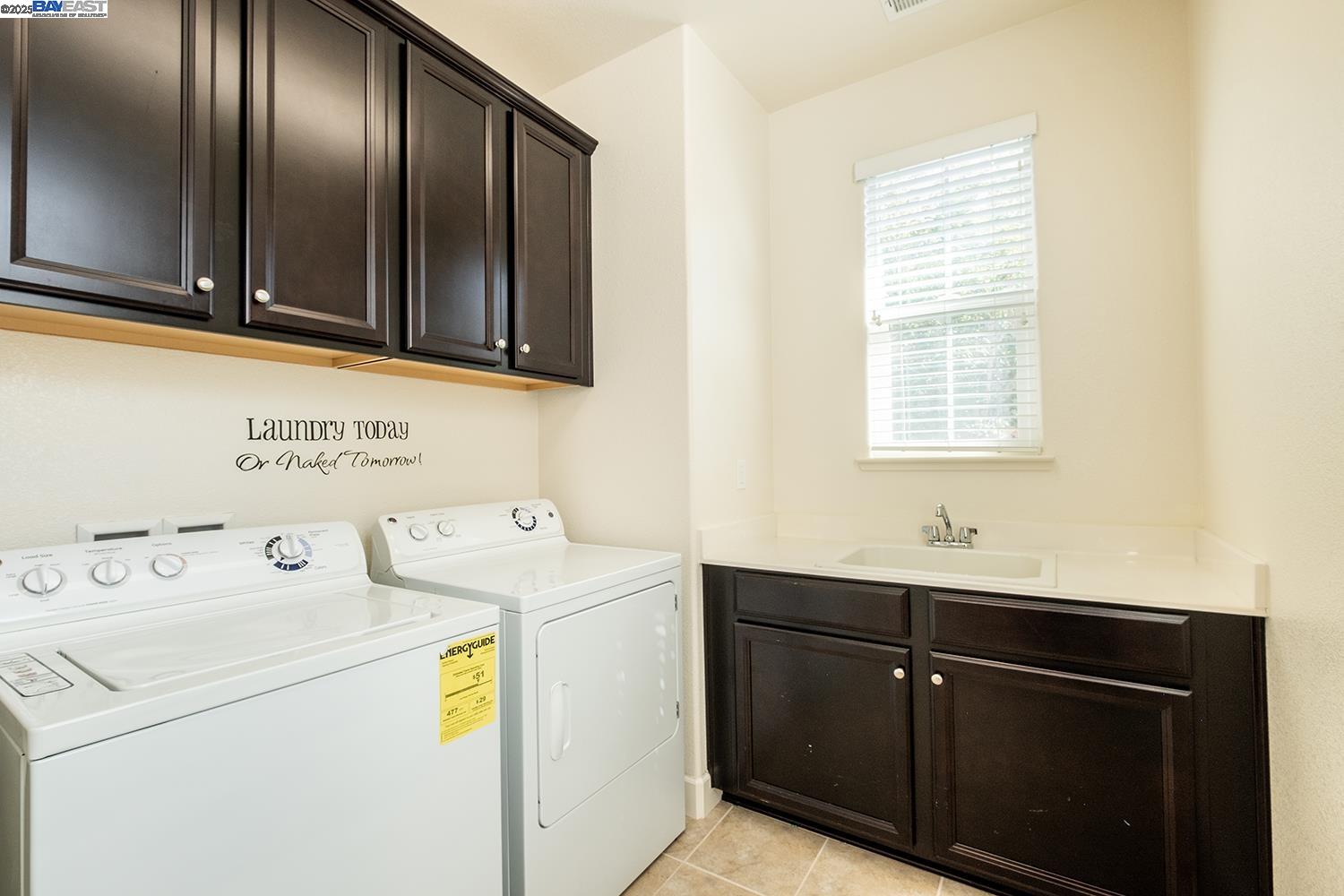 3135 Vittoria Loop Dublin, CA 94568 - Photo 21 of 38 a utility room with dryer and washer