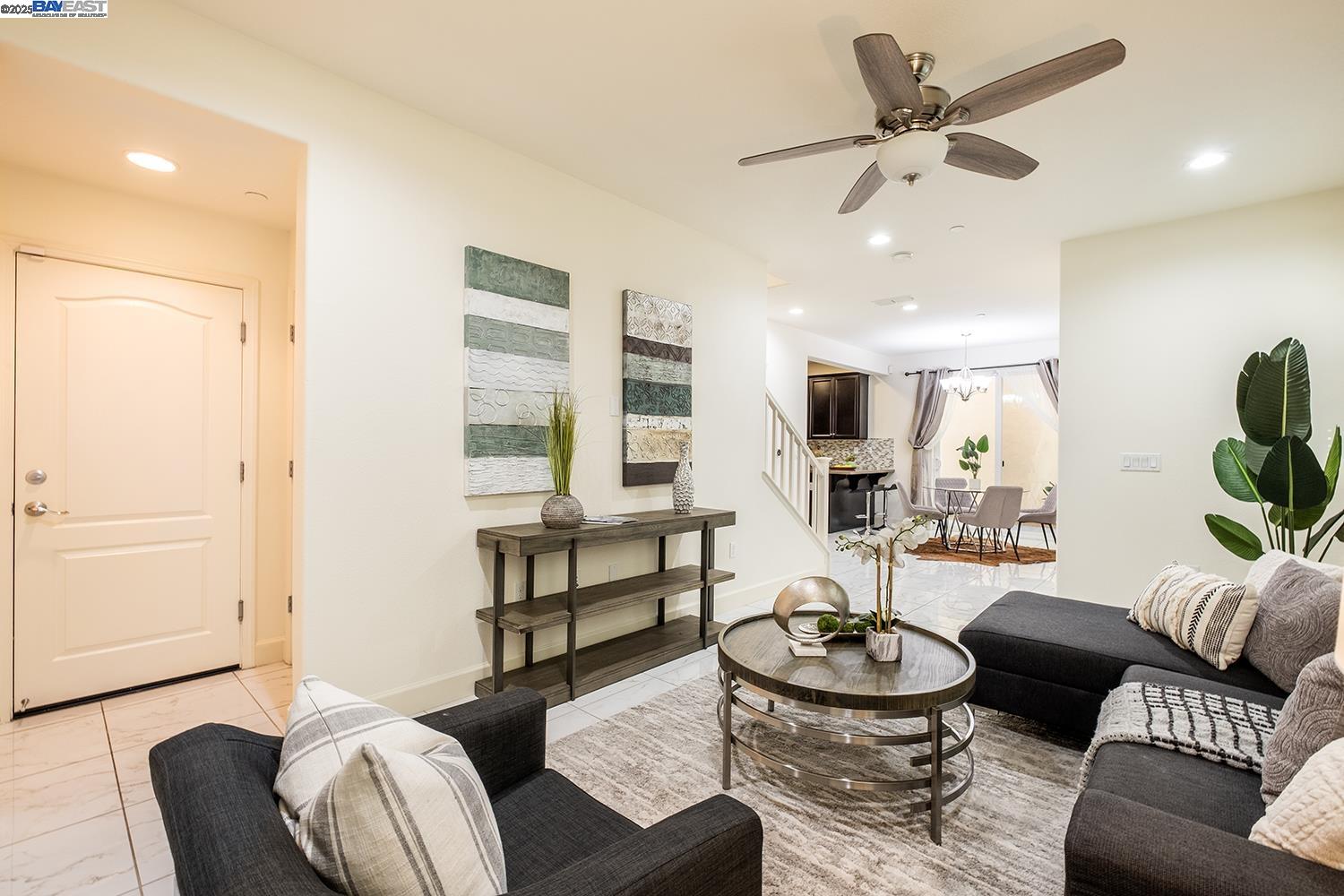 3135 Vittoria Loop Dublin, CA 94568 - Photo 9 of 38 a living room with furniture and a large window
