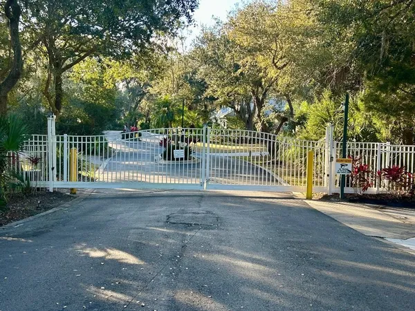 a view of a gate with a street view
