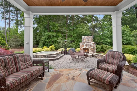 a view of a swimming pool with a yard