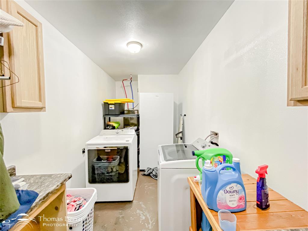 355 Farm To Market 604 Clyde, TX 79510 - Photo 19 of 30 a living room with furniture and a fireplace