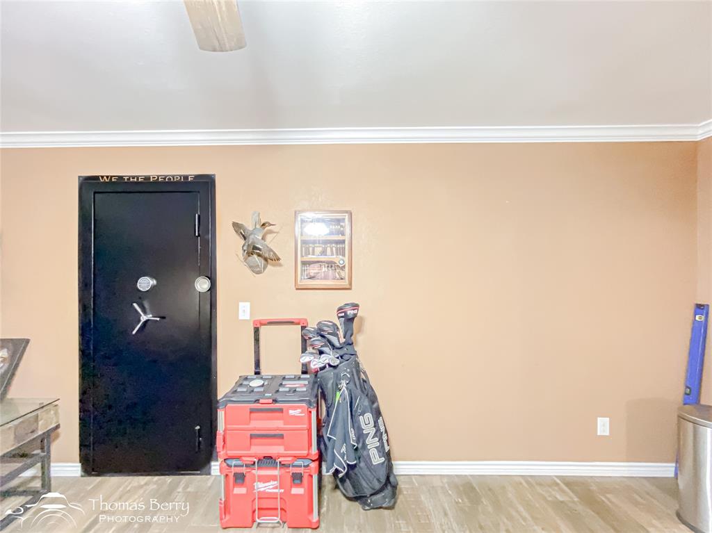 355 Farm To Market 604 Clyde, TX 79510 - Photo 24 of 30 a living room with furniture and a wooden floor