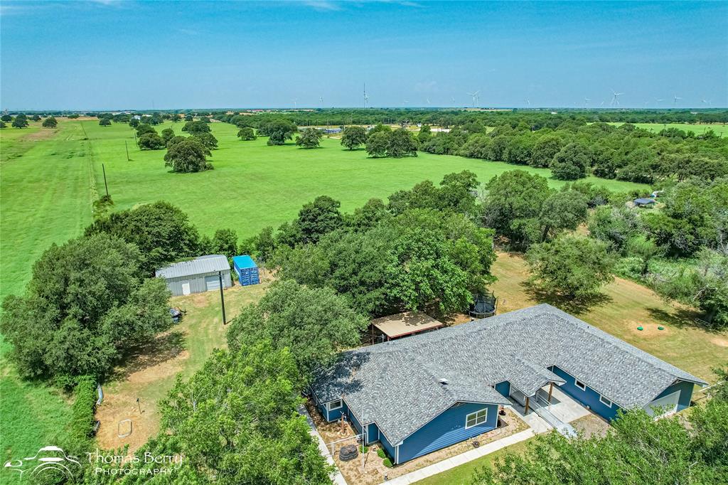 355 Farm To Market 604 Clyde, TX 79510 - Photo 29 of 30 an aerial view of a house with a yard