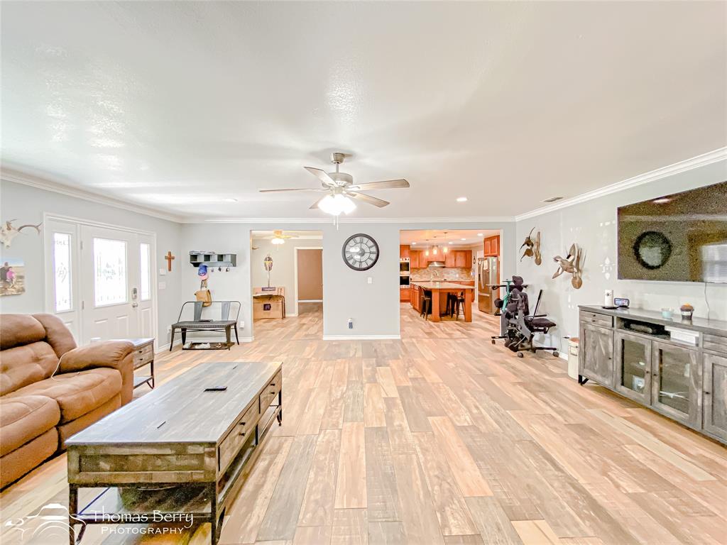 355 Farm To Market 604 Clyde, TX 79510 - Photo 5 of 30 a living room with furniture and wooden floor