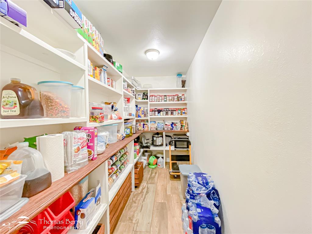 355 Farm To Market 604 Clyde, TX 79510 - Photo 8 of 30 a city view with wooden floor and furniture