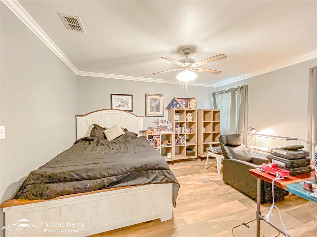 355 Farm To Market 604 Clyde, TX 79510 - Photo 9 of 30 a living room with furniture and a chandelier
