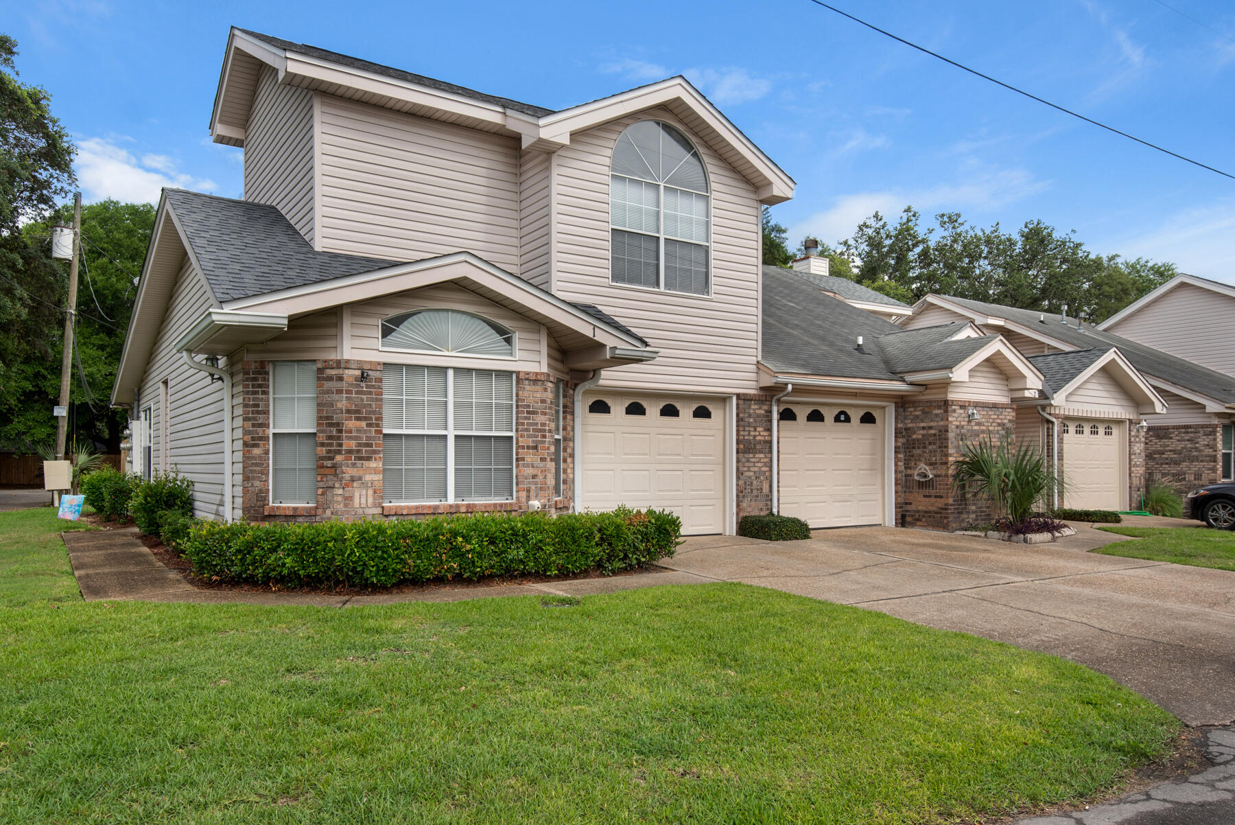 2 Falcon Ridge Lane Fort Walton Beach, FL 32547 - Photo 1 of 24 a front view of a house with a yard