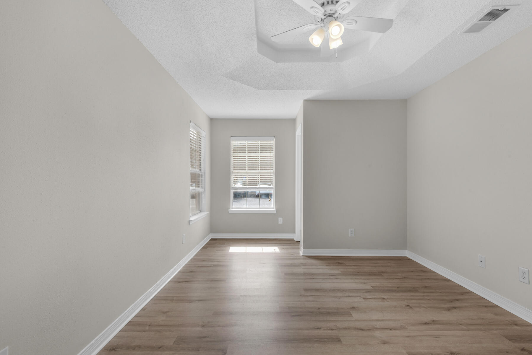 2 Falcon Ridge Lane Fort Walton Beach, FL 32547 - Photo 14 of 24 wooden floor in an empty room with a window