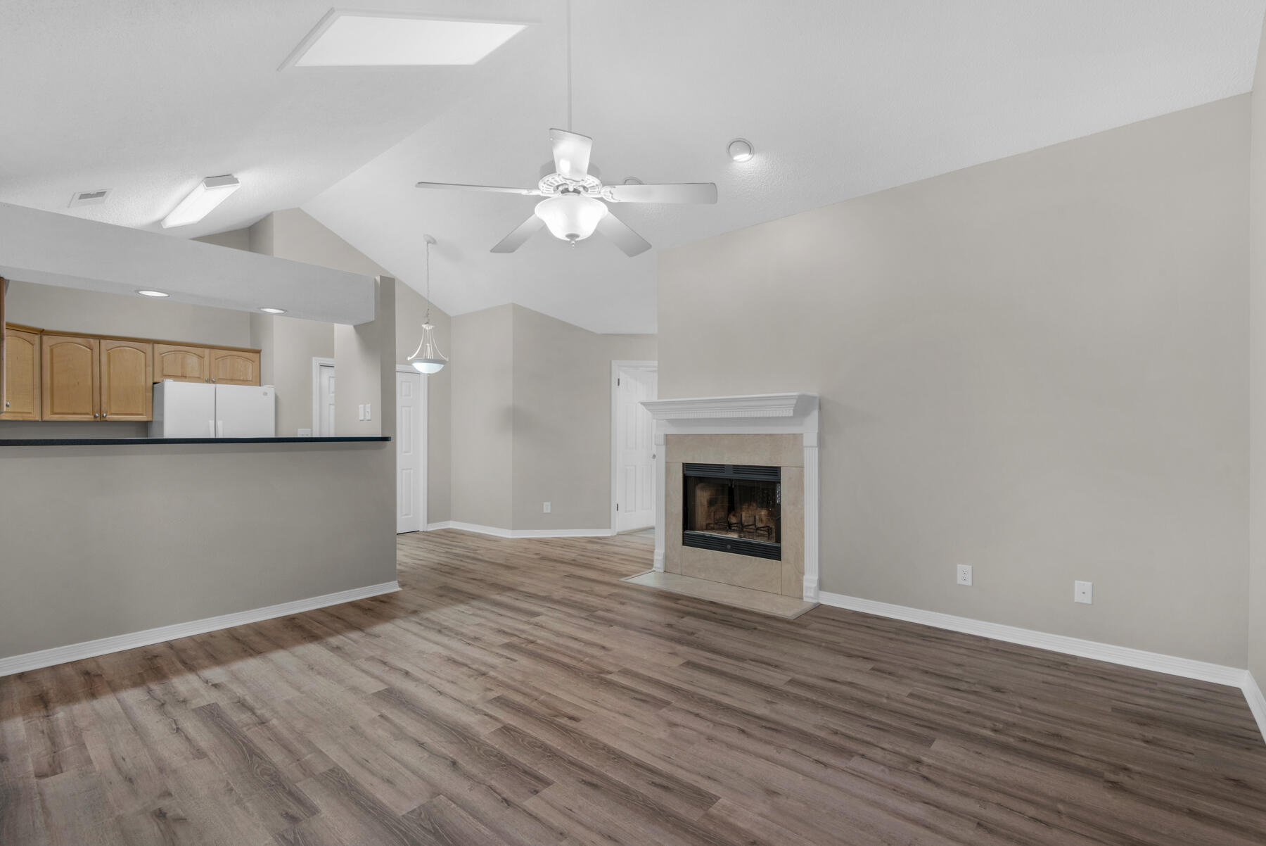 2 Falcon Ridge Lane Fort Walton Beach, FL 32547 - Photo 4 of 24 an empty room with wooden floor and windows