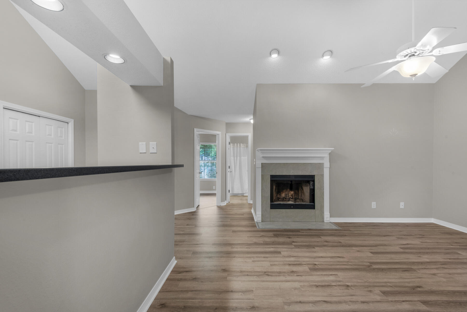 2 Falcon Ridge Lane Fort Walton Beach, FL 32547 - Photo 7 of 24 a view of a livingroom with wooden floor and a fireplace