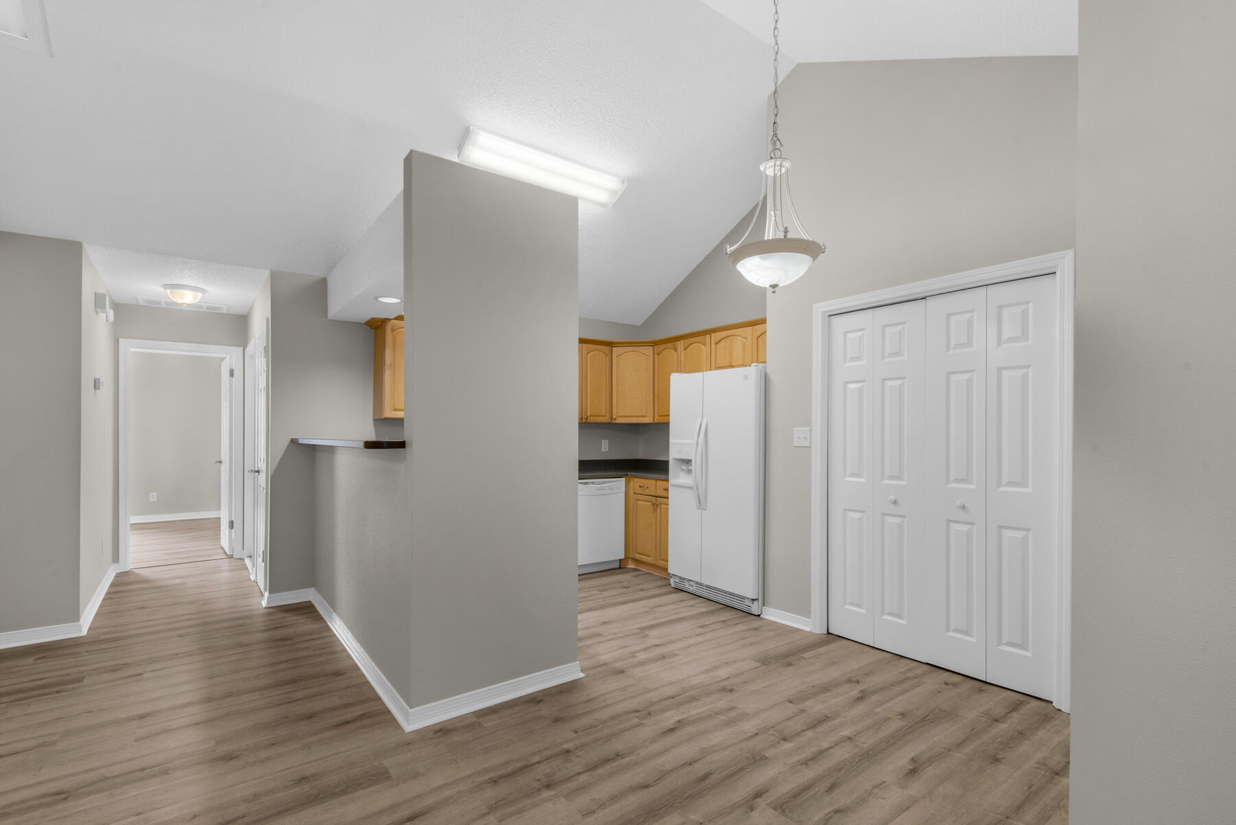 2 Falcon Ridge Lane Fort Walton Beach, FL 32547 - Photo 8 of 24 a view of an empty room with wooden floor and a window