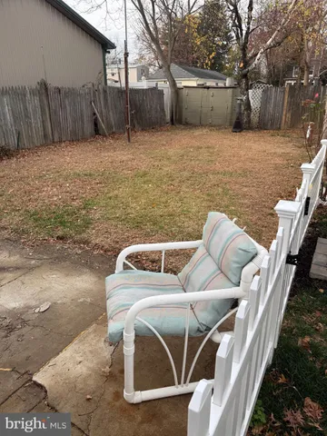 a view of a patio with a yard
