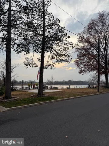 a view of a street with an trees