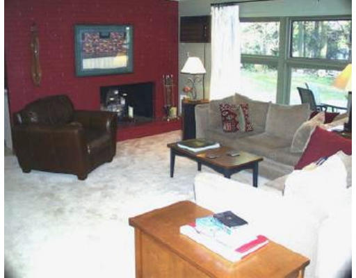 46 Joseph Road Framingham, MA 01701 - Photo 3 of 6 a living room with furniture and a large window