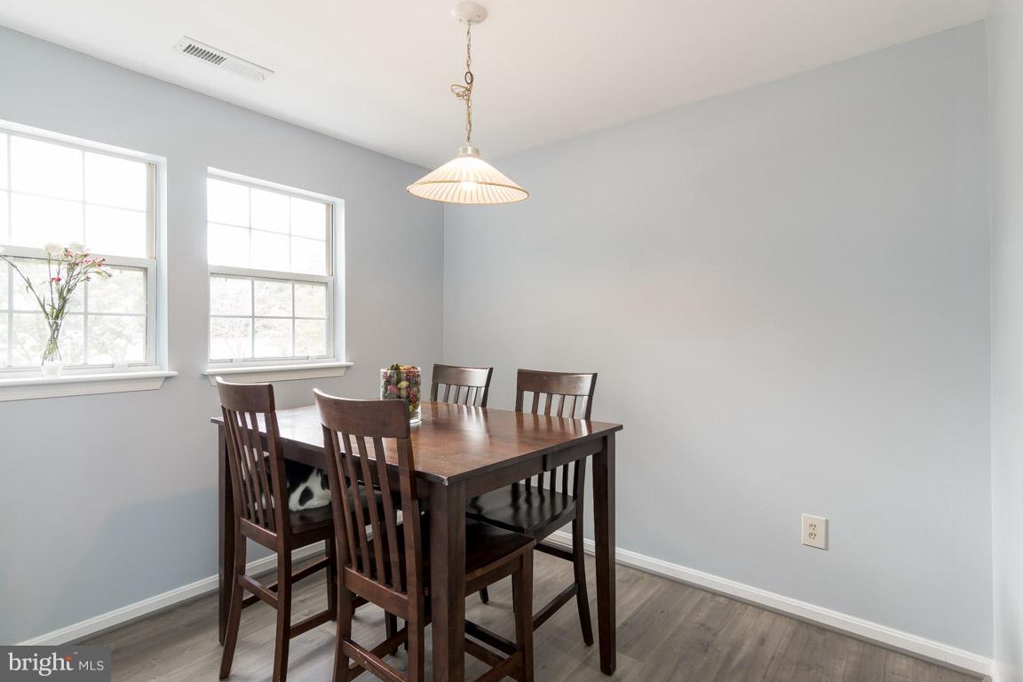 8589 Falls Run Road, Unit H Ellicott City, MD 21043 - Photo 16 of 30 Dining Room