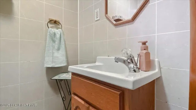 a aerial view of a house with a yard