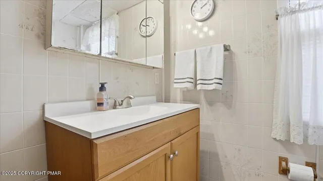 a view of a house with wooden deck
