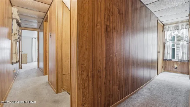 a front view of a house with parking space