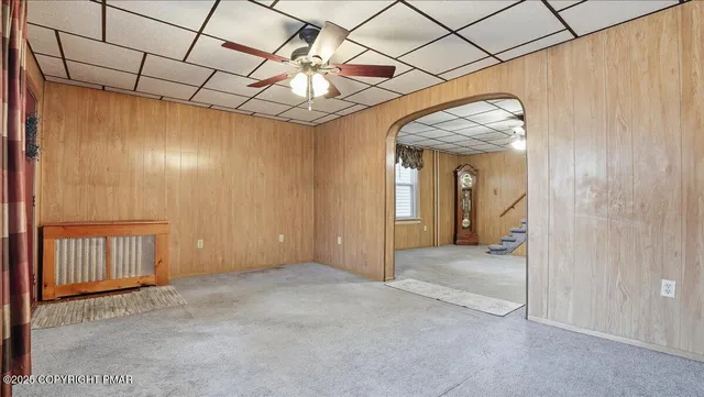 an aerial view of residential house with outdoor space and parking