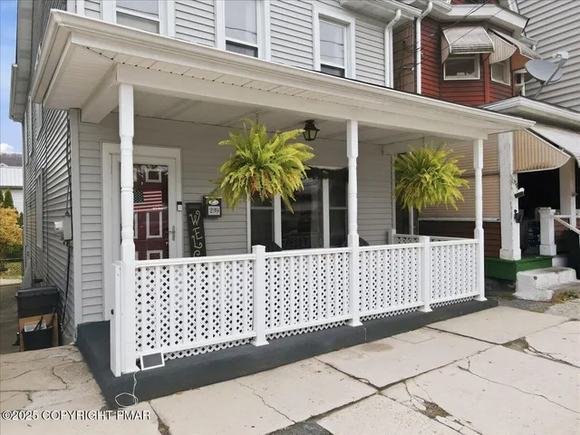 a view of livingroom with furniture and chandelier