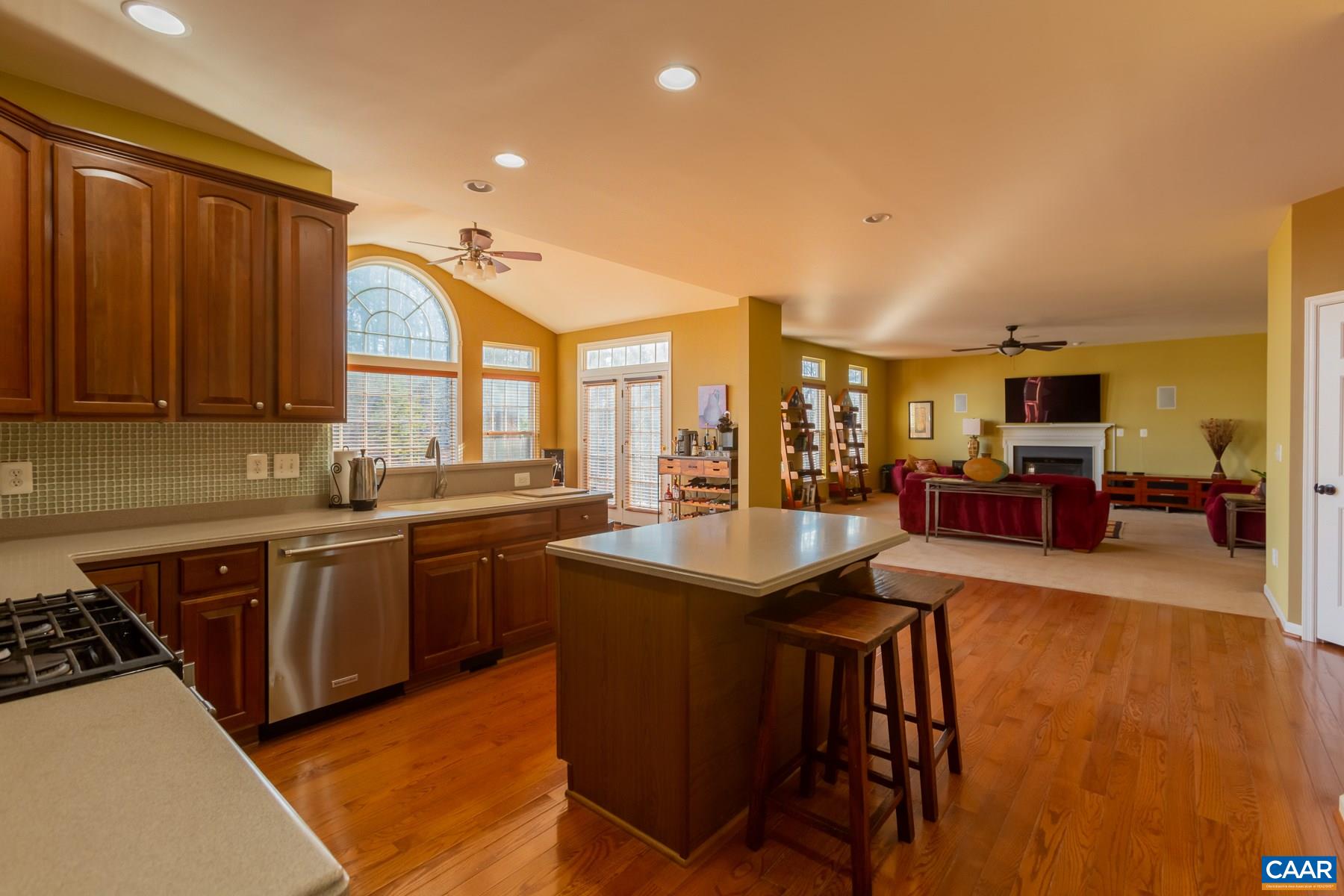 5384 Park Road Crozet, VA 22932 - Photo 4 of 10 a kitchen with stainless steel appliances granite countertop a sink a stove and a refrigerator